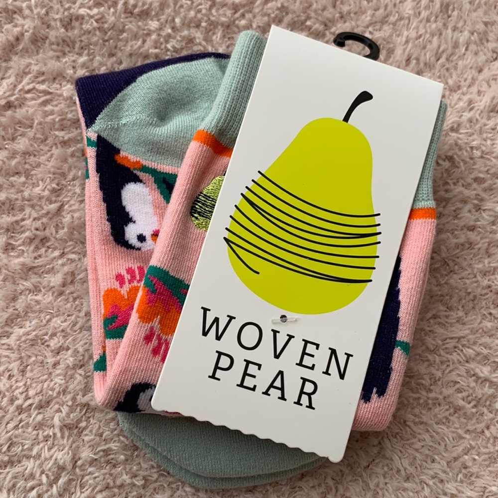 Woven Pear’s “Toucan Tango” Socks in Navy, Orange, White, & varied Pinks/Greens